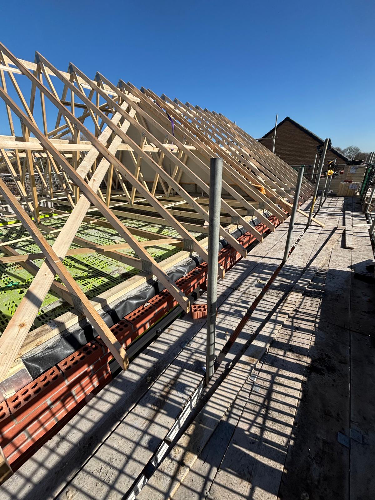 Roof trusses under construction on a housing development